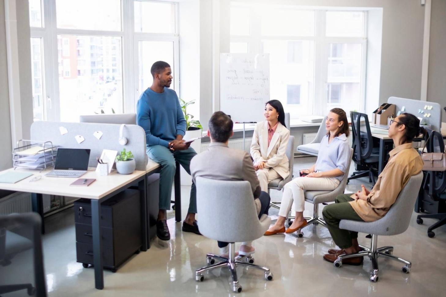 Team durante sessione di coaching collaborativo